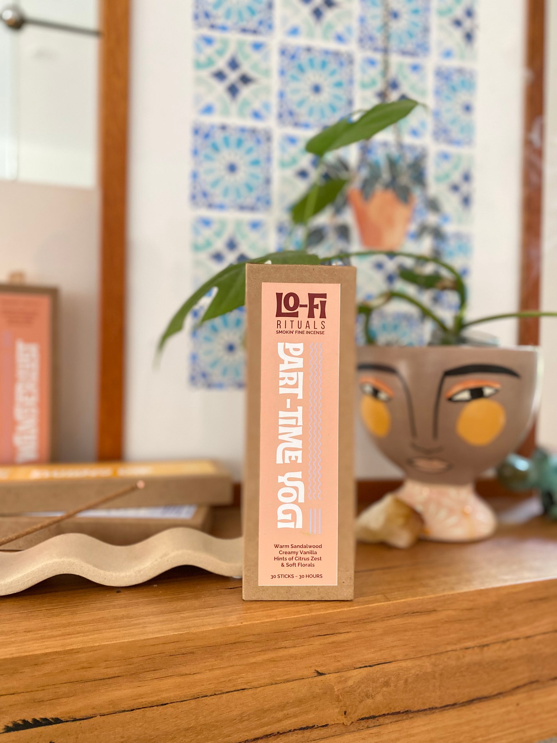 Box of  Lo-Fi Rituals Part-Time Yogi natural incense on a reclaimed timber shelf with decorative elements in the background