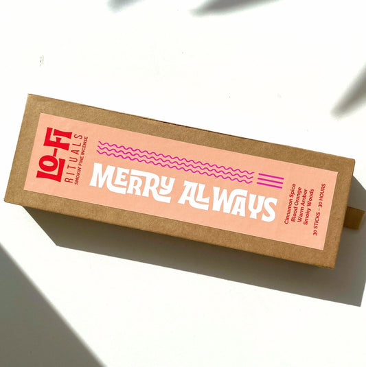 Lo-Fi Rituals Merry Always incense with a bright, bold and modern red, peach and pink label on a bright white background