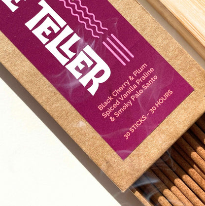 Close up image of Lo-Fi Rituals Fortune Teller incense, box is open and sun is shining on the incense sticks