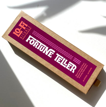 Image of kraft coloured box of incense, brightly labeled as Lo-Fi Rituals Fortune Teller smoky cherry incense
