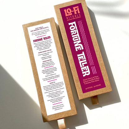 Front and back labels side by side of the Lo-Fi Rituals Fortune Teller incense box, scent description visible