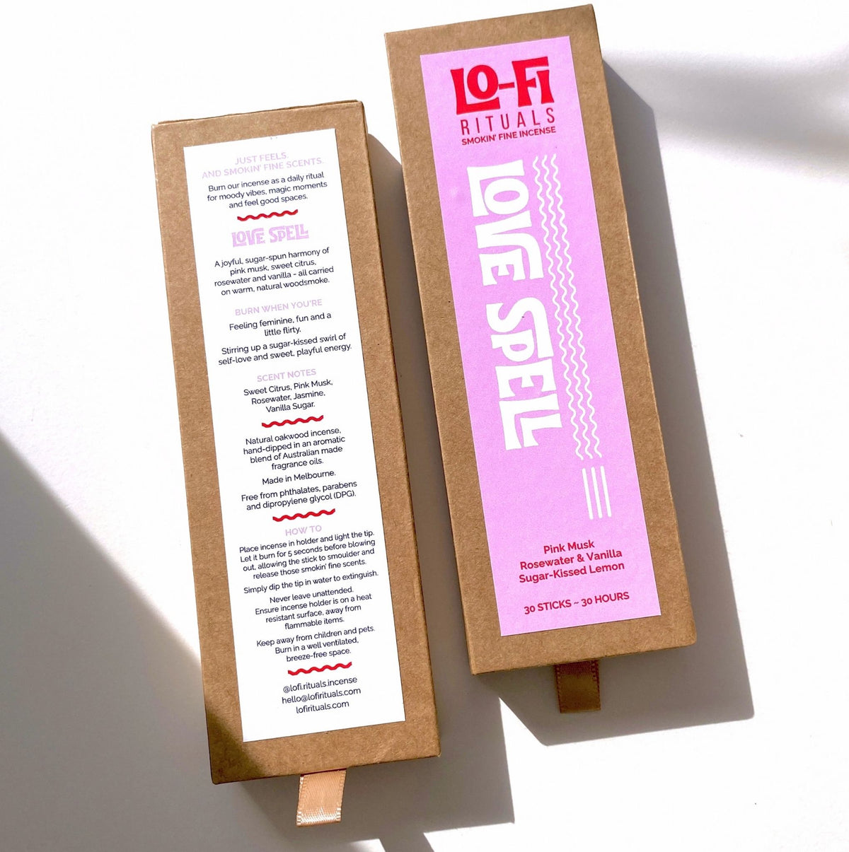 Image of front and back of the box labels of Lo-Fi Rituals 'Love Spell' rosewater and musk incense sticks, displayed on a white background with soft shadows