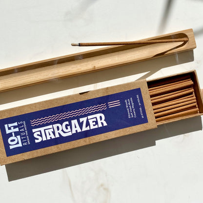 Open box of Lo-Fi Rituals Stargazer incense sticks with a bold modern label on a light background
