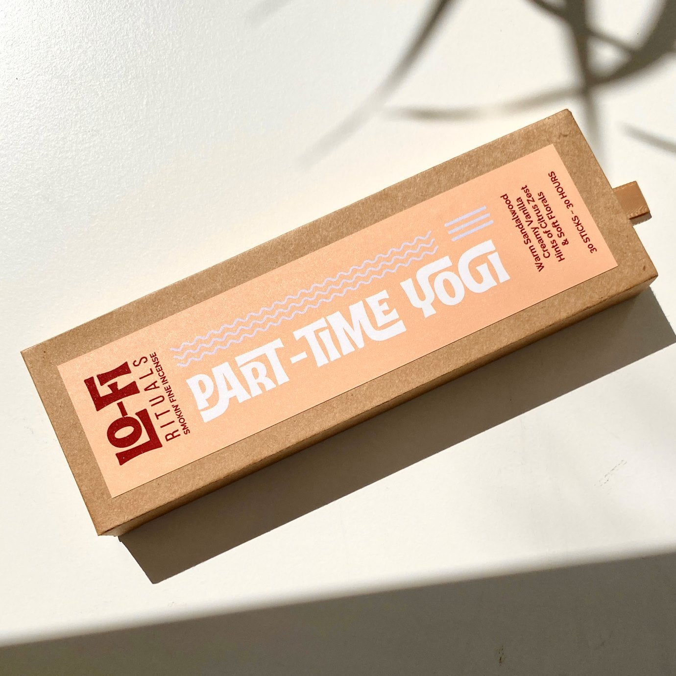 Lo-Fi Rituals Part-Time Yogi product image on sunlit white background with moody shadows